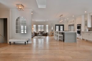 inside of a home with open light flooring
